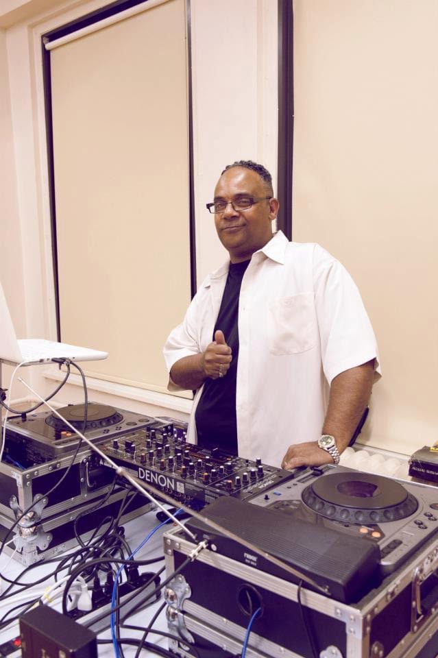 Honour Jackson, DJ Dr Arn Jay, at his turntables